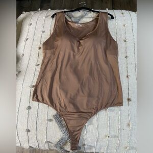 Brand New Spandex 2XL Women’s Bodysuit with built in Bra.